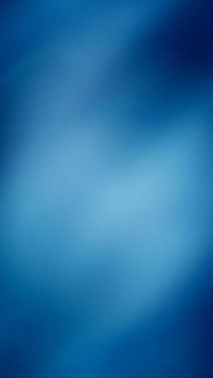 A Blue Background With A Blurred Background Wallpaper