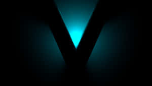 A Blue Light Is Shining On The Letter V Wallpaper