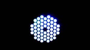 A Blue Light Is Shown In The Dark Wallpaper