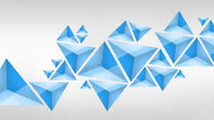 A Blue Triangle Background With Blue Triangles Wallpaper