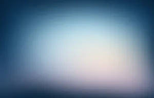 A Blurred Blue Background With A Light Blue Sky Wallpaper