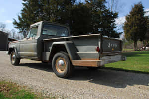 A Bold Jeep Gladiator In Off-road Terrains Wallpaper