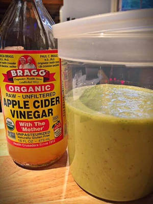 A Bottle Of Raw Apple Cider Vinegar Wallpaper