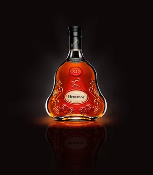 A Bottle Of Rum With A Black Background Wallpaper