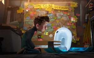 A Boy Is Sitting On A Chair Next To A Robot Wallpaper