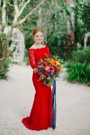 A Breathtaking Red Wedding Scene With Dramatic Lighting Wallpaper