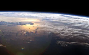 A Breathtaking Sunset Over A Vast Ocean Wallpaper