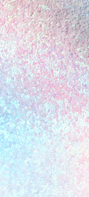 A Breathtaking Sunset Overlooking The Snow-covered Mountains Wallpaper