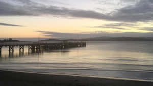 A Breathtaking View Of The Lower Hutt City Centre At Sunset. Wallpaper