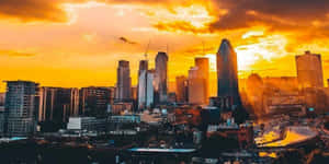 A Breathtaking View Of The Metropolitan Cityscape At Sunset In Laval. Wallpaper