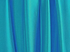 A Brilliant Turquoise Blue Background Of Sea And Sky Wallpaper