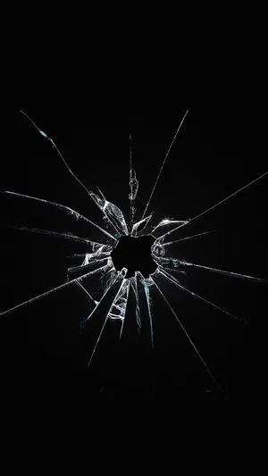 A Broken Glass On A Black Background Wallpaper