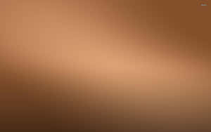 A Brown Background With A Light Brown Color Wallpaper