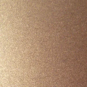 A Brown Laptop On A Table Wallpaper