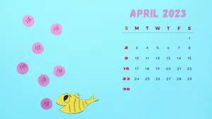 A Calendar With A Fish And A Pink Flower Wallpaper