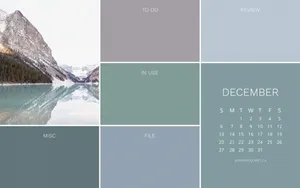 A Calendar With A Mountain And Lake In The Background Wallpaper