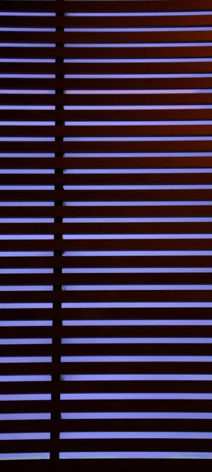 A Calm And Colorful Sunset Over The Ocean Wallpaper