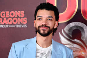 A Candid Moment With Justice Smith Wallpaper