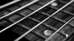 A Captivating Black And White Guitar Wallpaper