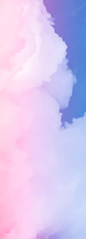 A Captivating Landscape Of Pink And Blue Clouds In The Sky. Wallpaper