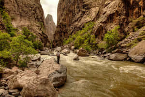 A Captivating View Of The Rocky Walls Of Black Canyon. Wallpaper