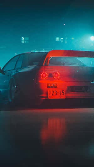 A Car Is Parked In A Dark Parking Lot Wallpaper