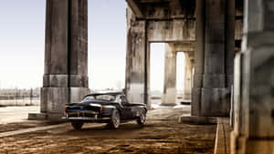 A Car Is Parked Under A Bridge Wallpaper