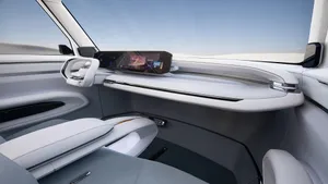 A Car With A White Interior And A Tablet Wallpaper