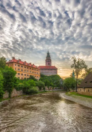 A Castle And River In The Background Wallpaper