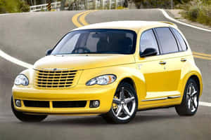 A Chrysler Pt Cruiser On A Scenic Journey Wallpaper