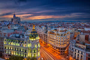 A City At Dusk With A View Of The City Wallpaper