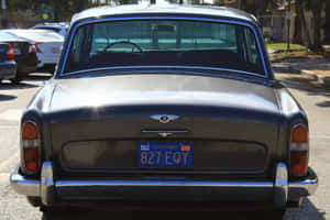 A Classic Bentley T1 Automobile In A Parking Lot Wallpaper