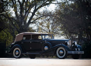 A Classic Cadillac Fleetwood In Its Prime Wallpaper