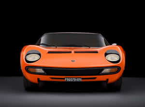 A Classic Lamborghini Miura In Stunning Orange Wallpaper