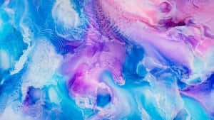 A Close Up Of A Blue And Purple Paint Wallpaper