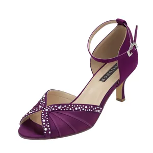 A Close Up Of A Bright Pair Of Purple Shoes Wallpaper