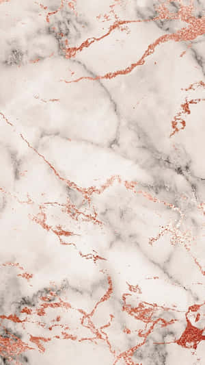 A Close Up Of A Marble With Rose Gold Paint Wallpaper