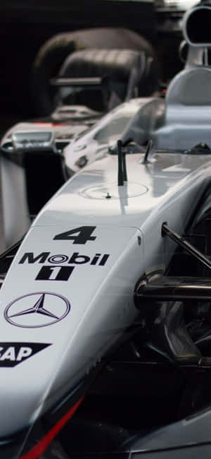 A Close Up Of A Mercedes F1 Car Wallpaper