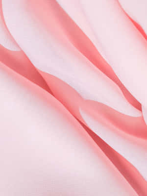 A Close Up Of A Pink Fabric Wallpaper