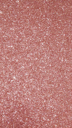 A Close Up Of A Pink Glittery Surface Wallpaper