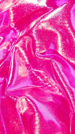 A Close Up Of A Pink Shiny Fabric Wallpaper