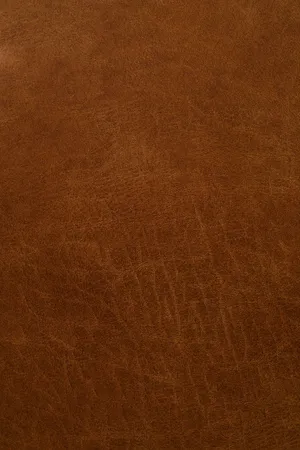 A Close-up Of A Rich Brown Leather Texture Wallpaper