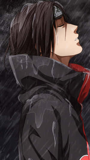 A Close Up Of Itachi Uchiha’s Face Wallpaper