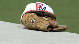 A Close-up Of Leather Baseball Gloves Wallpaper