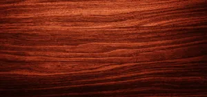 A Close-up Of Mahogany Wood Grain Texture Wallpaper