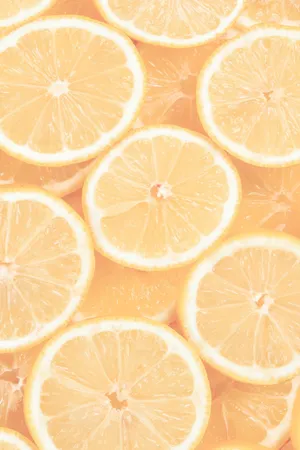 A Close Up Of Sliced Lemons Wallpaper