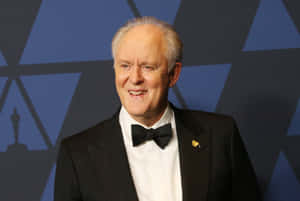 A Close-up Shot Of Iconic Actor John Lithgow Wallpaper