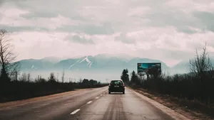 A Close-up View Of A 4k Hdmi Gold Plated Connector With Intertwined Cables Wallpaper