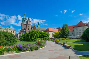 A Closer Look At Wawel Castle In Krakow Poland Wallpaper