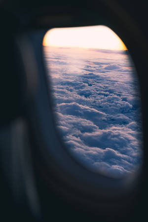 A Closer Look Of The Clouds From A Plane Window Wallpaper